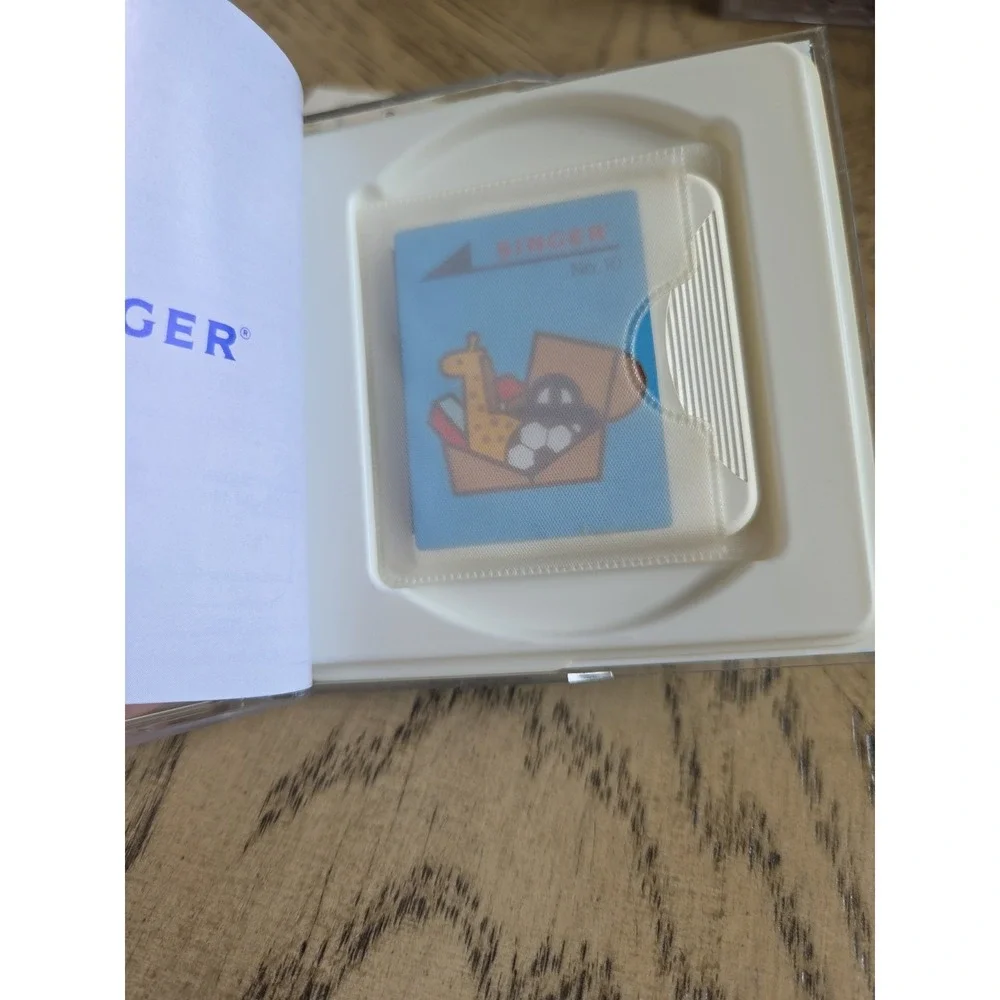 Singer embroidery card